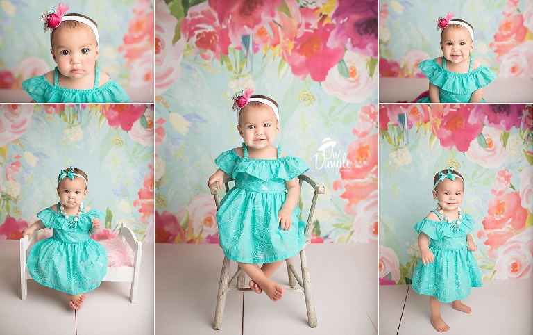 Dallas custom 1 year cake smash sessions.  Pretty little girl with floral backdrop